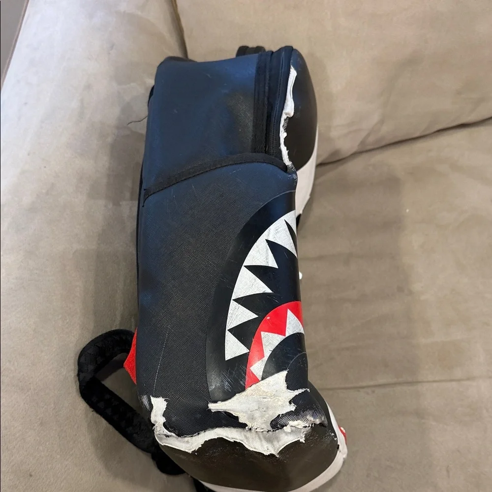 Sprayground Black and White Shark Backpack with Red Accents - Picture 2 of 7